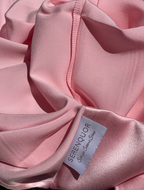 Close up of Serenquor 100% Mulberry Silk Pillowcase showing premium stitching and 22 Momme silk fabric in Light Pink