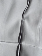 Close up of the inner stitching on a Serenquor 100% Mulberry Silk Pillowcase in Silver showing premium craftsmanship and durable construction